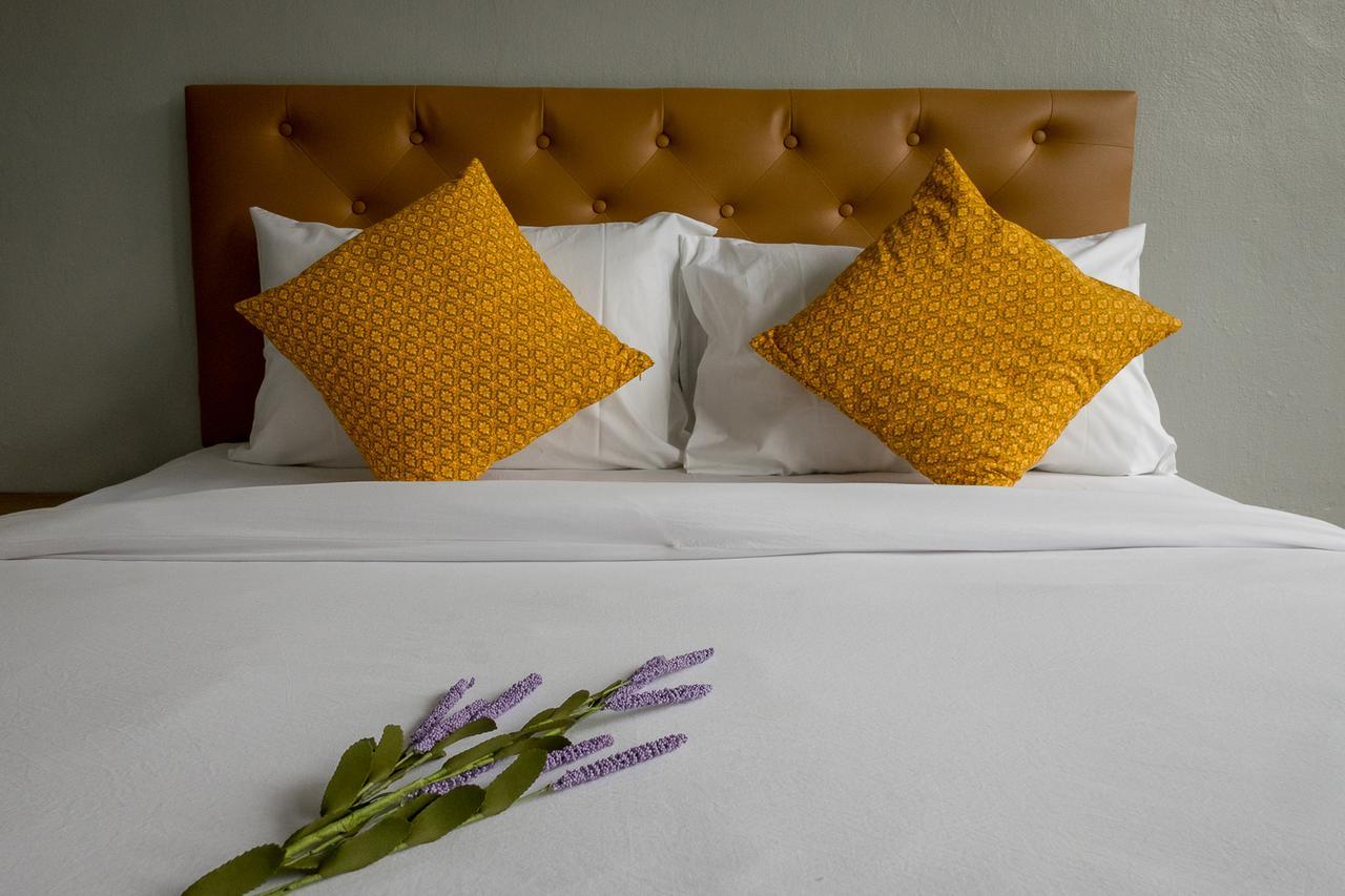 Pugdee Hotel Lang Suan Bagian luar foto